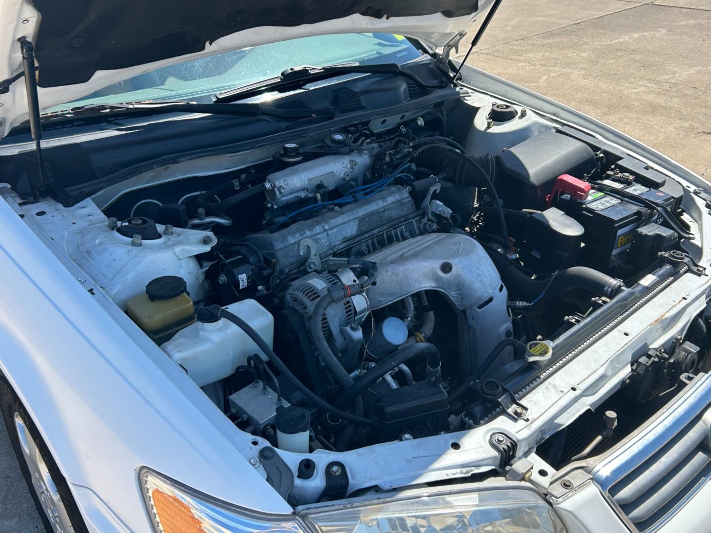 2000 White /TAN Toyota Camry LE (JT2BN22K7Y0) with an 2.2L L4 DOHC 16V engine, 4-Speed Automatic transmission, located at 17760 Hwy 62, Morris, OK, 74445, (918) 733-4887, 35.609104, -95.877060 - 2000 TOYOTA CAMERY HAS 2.2L AND IS FWD. THIS IS A DEDICATED CNG (COMPRESSED NATURAL GAS). FEATURES POWER LOCKS, POWER WINDOWS, POWER MIRRORS, MANUAL SEATS, AMFM STEREO, CASSETTE PLAYER, CRUISE CONTROL, TILT WHEEL, CLOTH SEATS. ****CLEAN TITLE*** 142,379 MILES 205/65R15 TIRES THIS SHOULD QUALIFY FOR - Photo#17